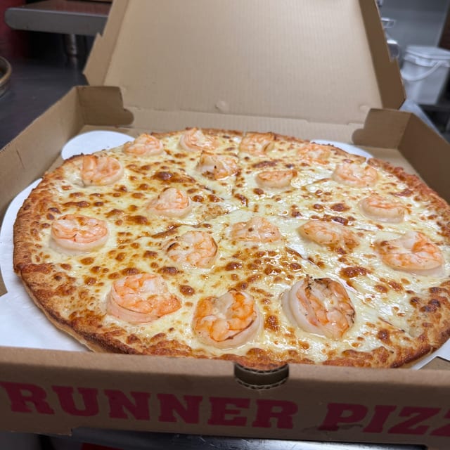 Shrimp Alfredo Pizza.